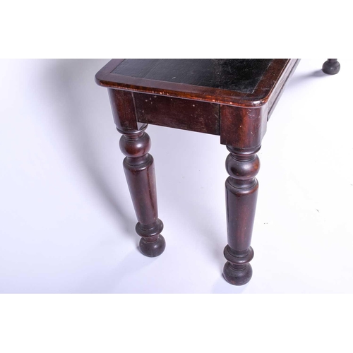 131 - A Victorian mahogany side table, the rectangular top with rounded corners and leather writing surfac... 