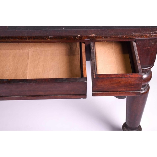 131 - A Victorian mahogany side table, the rectangular top with rounded corners and leather writing surfac... 