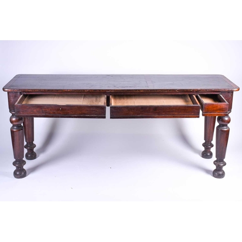 131 - A Victorian mahogany side table, the rectangular top with rounded corners and leather writing surfac... 