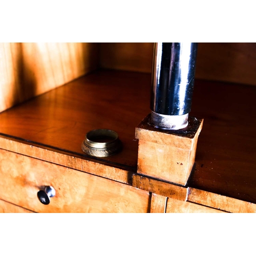 141 - A 19th century Biedermeier walnut Secretaire A Abbatant, with moulded ebonised pediment above a frie... 