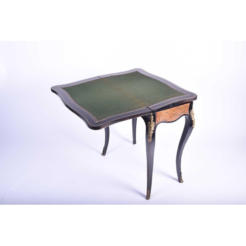 145 - A late 19th century boulle marquetry card table, with gilt metal mounts and red tortoiseshell colour... 