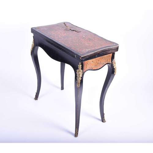 145 - A late 19th century boulle marquetry card table, with gilt metal mounts and red tortoiseshell colour... 