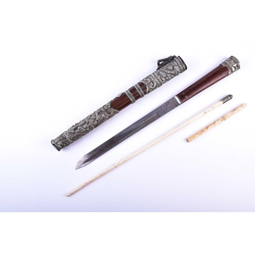 161 - A Chinese knife and chopstick set, the case with embossed white metal mounts decorated with dragons ... 