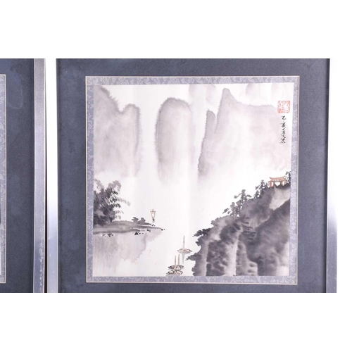 169 - Three Chinese prints of misty mountain and river scapes with wash detail. Bearing red studio marks i... 