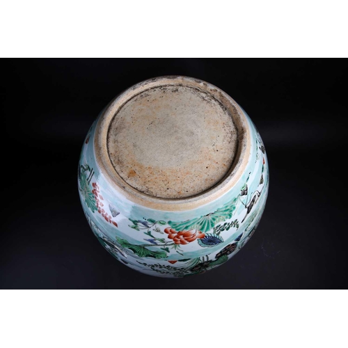 179 - A Chinese porcelain fishbowl, 19th/20th century, painted with a watery landscape with blossoming lot... 