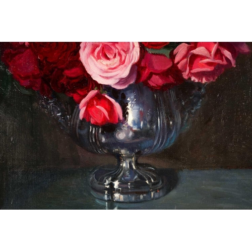 18 - A 20th century still life study, roses in a bowl, oil on board, indistinctly signed, 55 cm x 43 cm i... 