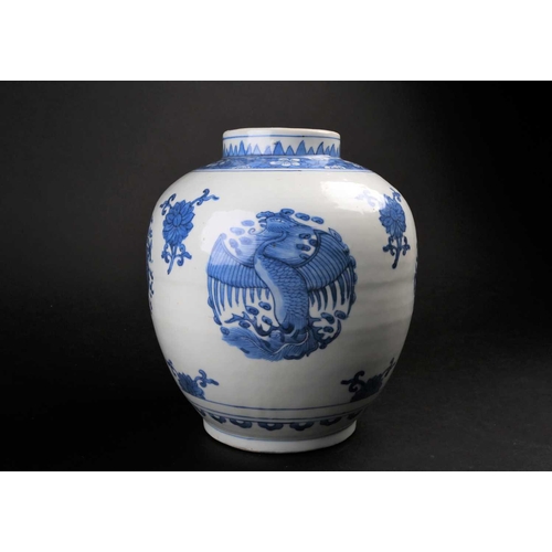 180 - A Chinese blue & white dragon & Phoenix vase, in the Ming style, a painted dog tooth neck above a pr... 