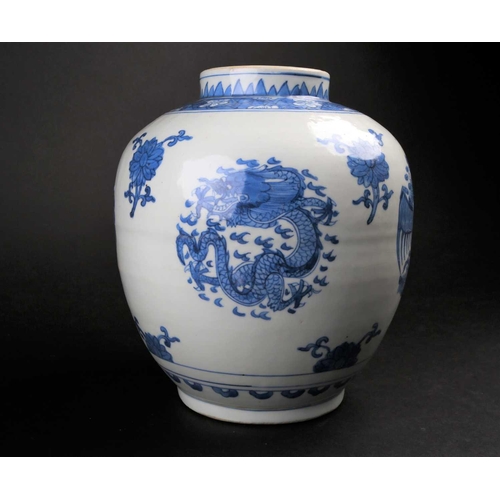 180 - A Chinese blue & white dragon & Phoenix vase, in the Ming style, a painted dog tooth neck above a pr... 