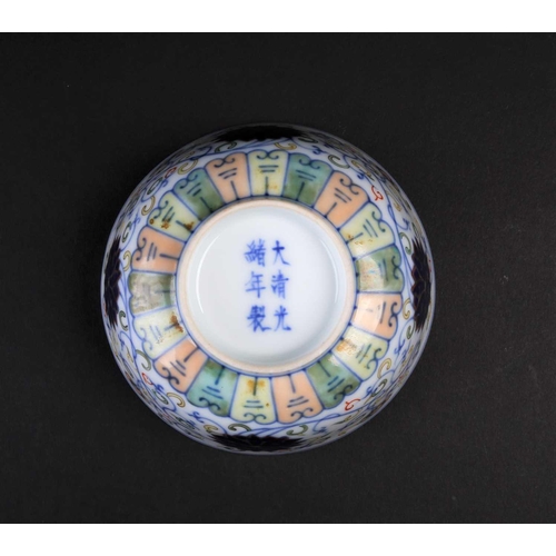 182 - A Chinese doucai Lotus bowl, painted with blue lotus flowers amongst fronds above a false gadroon bo... 