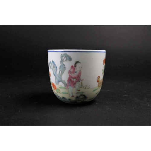 183 - A Chinese porcelain 'Chicken' wine cup, painted with a figure holding corn with chickens and chicks ... 