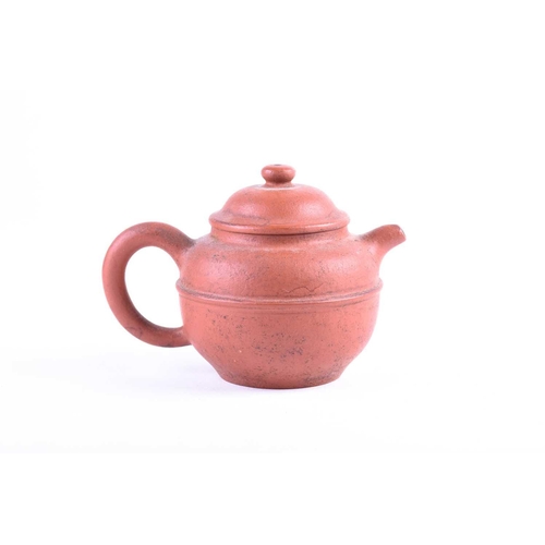 185 - A small Chinese Yixing teapot, the body with a raised band, incised Meng Chen and further marks to t... 