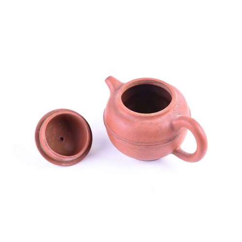 185 - A small Chinese Yixing teapot, the body with a raised band, incised Meng Chen and further marks to t... 