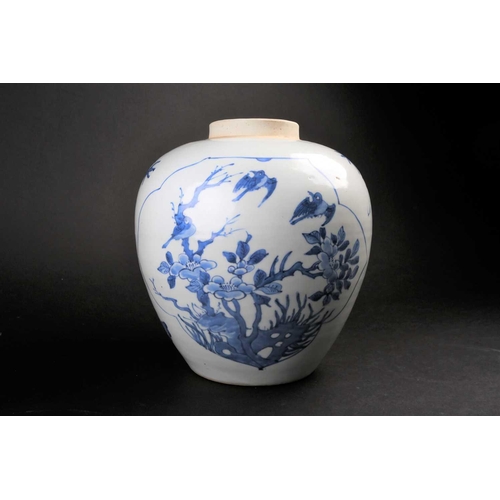 188 - A Chinese blue and white Transitional vase, mid 17th century, the ovoid body with shaped panels of b... 