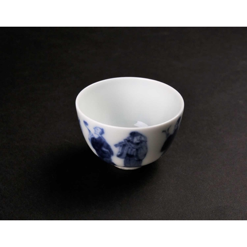 189 - A Chinese blue & white wine cup, Qing, painted with eight immortals above a band of waves, apocrypha... 