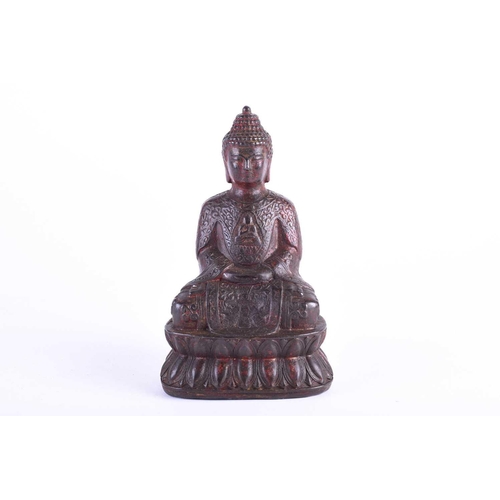 196 - A Chinese bronze buddha, seated in Dyhana mudra, traces of red pigment and gilt throughout, on doubl... 