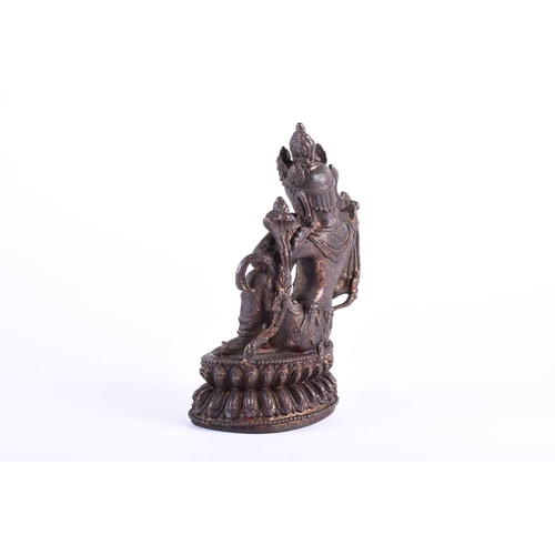 197 - A Sino Tibetan bronze figure of Boddhisatva tara, on double lotus petal throne, traces of red pigmen... 