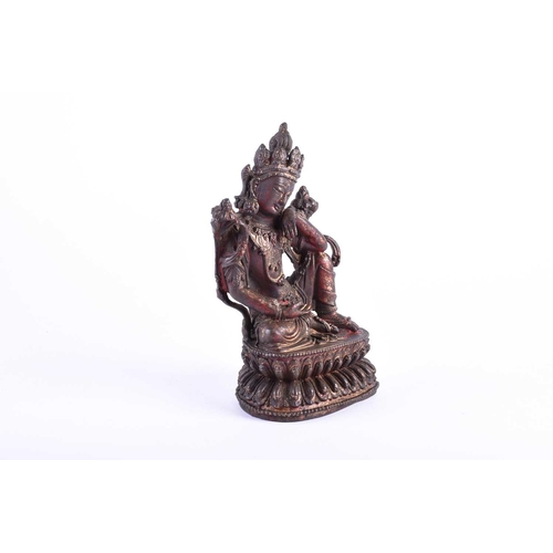 197 - A Sino Tibetan bronze figure of Boddhisatva tara, on double lotus petal throne, traces of red pigmen... 