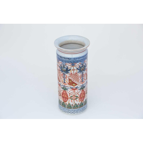 220 - An unusual Arita cylindrical vase, circa 1860, enamelled and gilt with shield panels hung with pearl... 