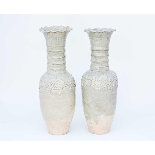 232 - Two Chinese celadon funerary vases, one dated 1404, each with elongated ovoid body, engraved with a ... 