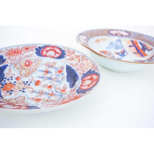 238 - Two Japanese Arita porcelain barbers bowls, 17th century, depicting a dignitary with an attendant ho... 