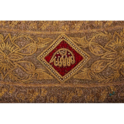 260 - An Indian gold and silver thread and pearl, table frieze, 19th/20h century, of slightly curving form... 