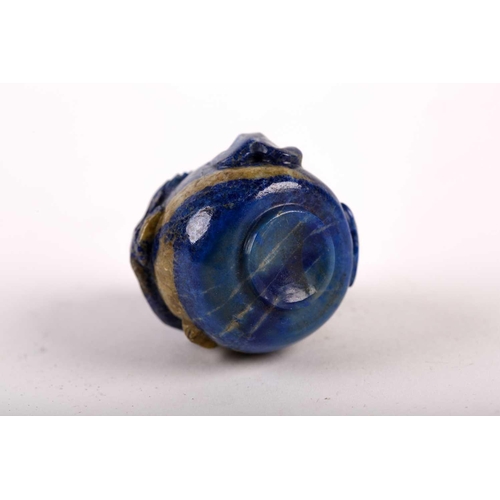 262 - A Chinese carved lapis lazuli snuff bottle, 19th/20th century, carved as a miniature vase, a chilong... 