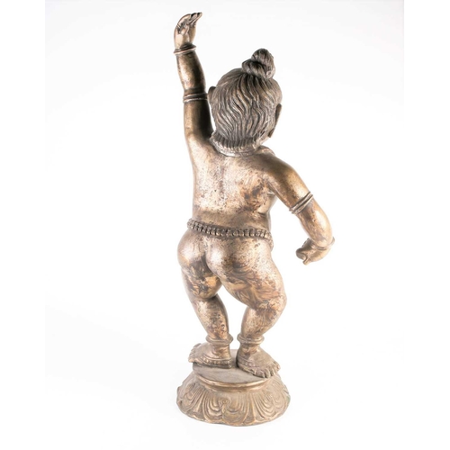 266 - A large Indian bronze figure of Krishna, 19th/20th century, modelled in dancing pose, wearing bells ... 