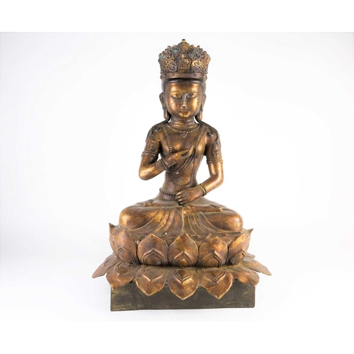 268 - A Chinese bronze figure of Avalokitesvara, 20th century, seated in mudra pose on a double lotus thro... 