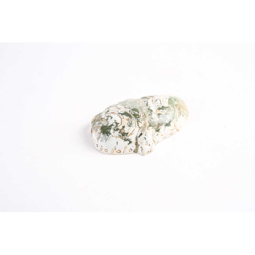 275 - A Chinese celadon jade betrothal spirit, Han dynasty, in the form of a buffalo, the reverse with squ... 