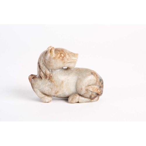 283 - A Chinese jade horse, Qing dynasty, carved looking back over itself, the stone a white/grey with fle... 