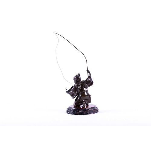 291 - A Japanese bronze figure of Ebisu, Meiji period, naturalistically modelled landing a fish, on wood b... 