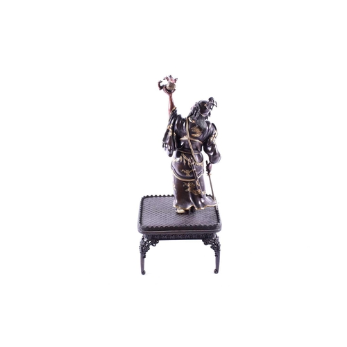 298 - A good Japanese bronze figure of Shoki the Demon Queller, Meiji period, well modellled holding aloft... 