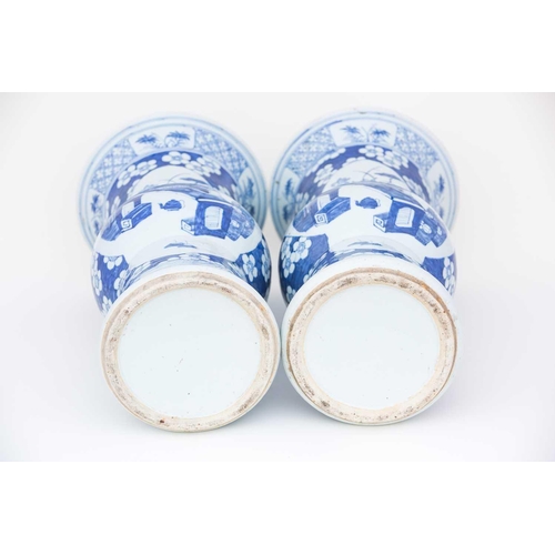 305 - A pair of Chinese blue & white Gu form vases, 19th century, decorated with quatrelobed panels of lot... 