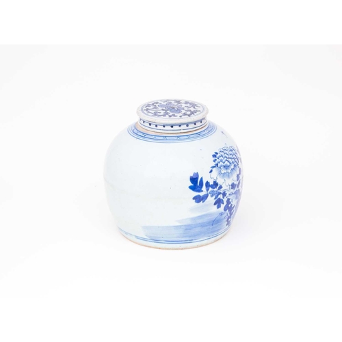 306 - A Chinese blue & white ginger jar and matched cover, 19th century, the cover painted with a lotus fl... 