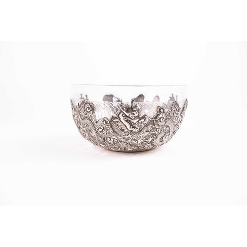 313 - A Chinese silver bowl, late 19th century, struck for undocumented maker WA, with three dragons among... 