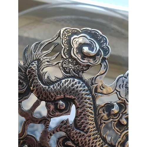 313 - A Chinese silver bowl, late 19th century, struck for undocumented maker WA, with three dragons among... 