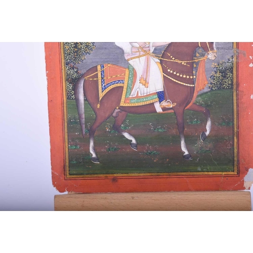 331 - Indian school, 19th century, Royal Prince on horse, before a river and landscape, within yellow and ... 