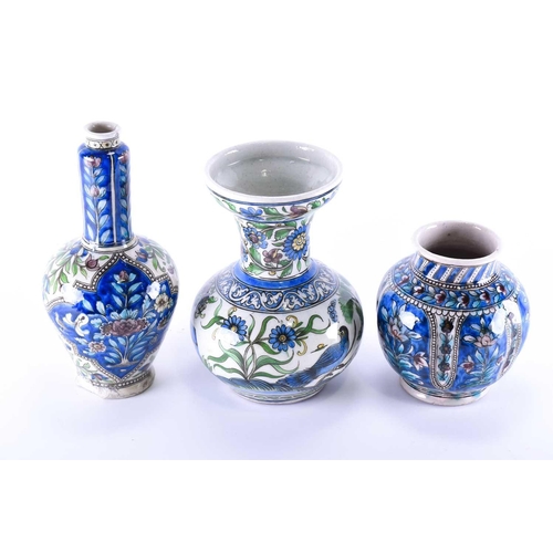 344 - Three Persian Qajar pottery vases, 19th century, one with a depiction of a prince and princess withi... 