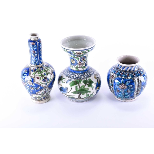 344 - Three Persian Qajar pottery vases, 19th century, one with a depiction of a prince and princess withi... 