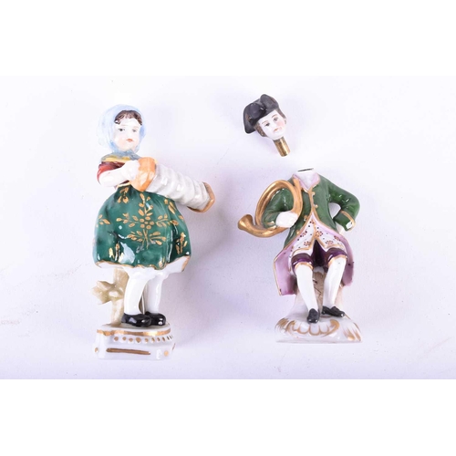 393 - An 18th century Chelsea Porcelain miniature scent bottle, modelled as a man in a tricorn hat with a ... 