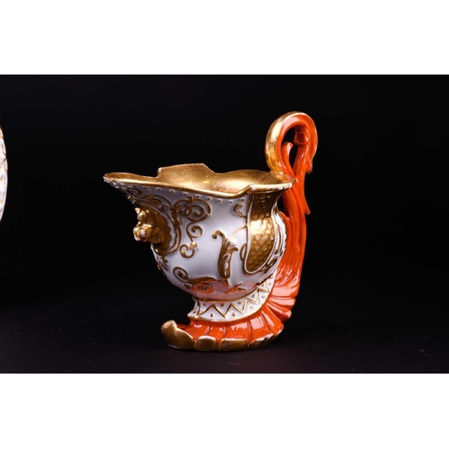 394 - A 19th century Jacob Petit French porcelain helmet jug with scroll handle, gilt finished on a white ... 