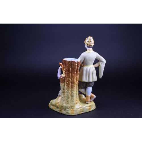 404 - A Russian Gardner porcelain figure group, a seated female musician before a tree stump, with a man i... 