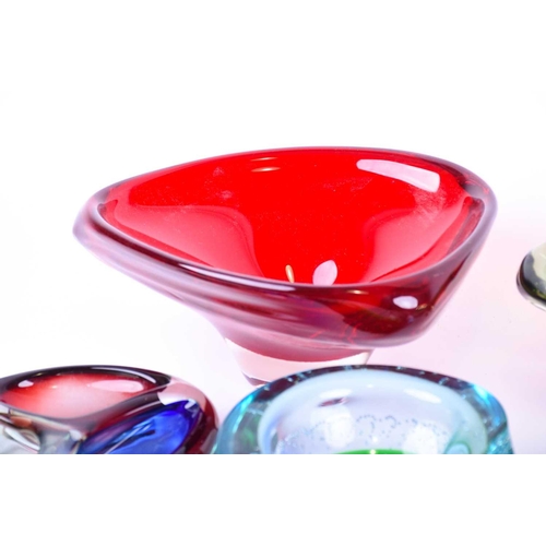 408 - A collection of mid-20th century art glass, to include bowls, ashtrays and paperweights, the largest... 