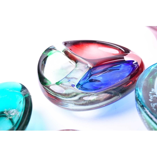 408 - A collection of mid-20th century art glass, to include bowls, ashtrays and paperweights, the largest... 