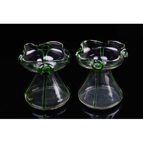 412 - A pair of early 20th century Stuart art nouveau glass posy vases, of squat waisted form, with applie... 