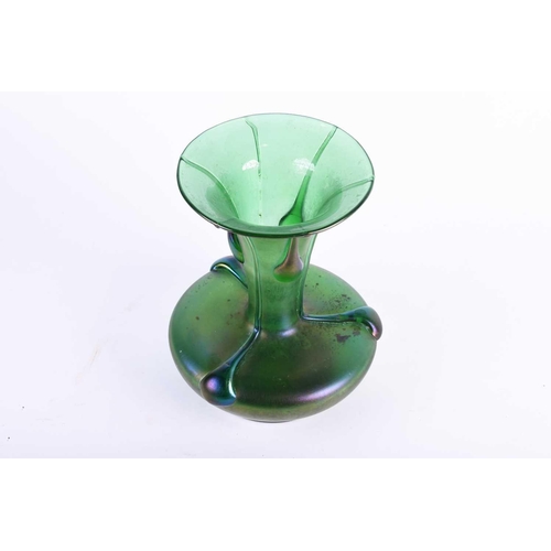 413 - An Art Nouveau design green glass vase, with applied trails and lustre finish, of compressed body fo... 