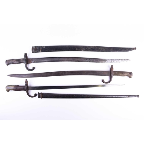 431 - Two French Model 1866 Yataghan Chassepot bayonet, one with engraved back 'Mre Imple de St Etienne Ma... 