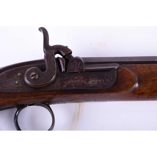 435 - A 20 bore percussion sporting rifle, the lock plate engraved D N Ratcliffe within oak leaves, the st... 