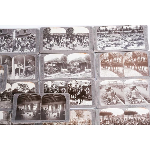 442 - A collection of 30 WWI interest stereoscopic cards, produced by Realistic Travels Publishers, to inc... 