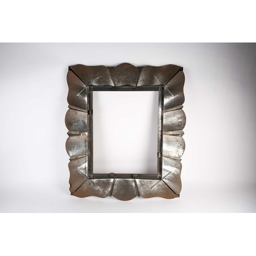 457 - An Art Deco period copper mirror frame, traces of silvering to rear, internal measurements 50.5cm x ... 